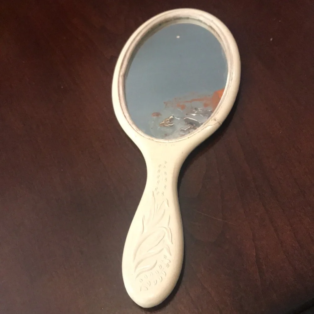 Antique hand held mirror in original dresser box